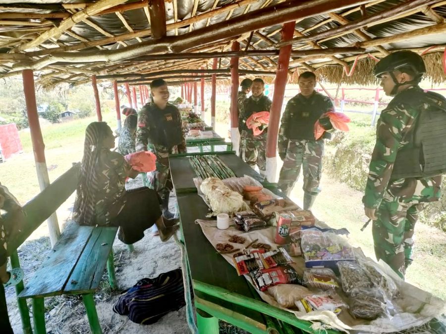Peran Satgas Yonif Mekanis 203/AK Dalam Meningkatkan Perekonomian Masyarakat Papua